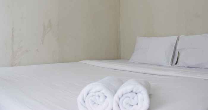 Bedroom Pleasant 2BR at Gateway Ahmad Yani Apartment By Travelio