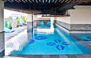 Kolam Renang 5 Modern Chic Studio at Tamansari La Grande Apartment near BIP By Travelio