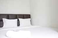 Bedroom Homey 2BR near Maranatha University at Majesty Apartment By Travelio