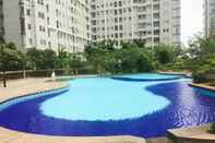 Swimming Pool Modern and Comfy 2BR Seasons City Apartment with City View By Travelio