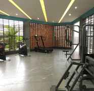 Fitness Center 2 Cozy and Modern 1BR Apartment Amega Crown Residence By Travelio