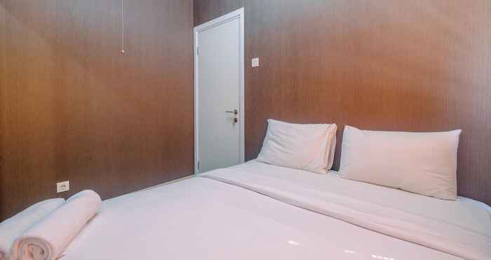 Bedroom Comfort 1BR with Study Room at Green Pramuka Apartment By Travelio