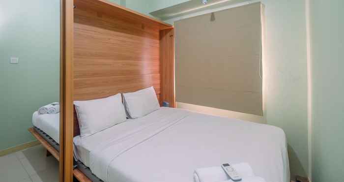 Bedroom Trendy Connecting Mall 2BR at Green Pramuka Apartment By Travelio