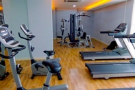 Fitness Center Cozy Stay at Furnished 2BR Bassura City Apartment By Travelio