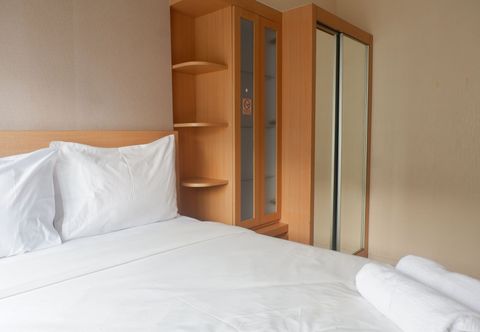 Bedroom Best Price 2BR at Educity Apartment By Travelio
