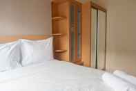 Bedroom Best Price 2BR at Educity Apartment By Travelio