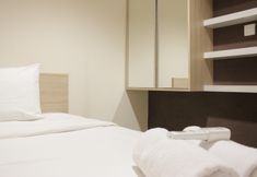 Bedroom 2 Best Location 2BR Apartment at Tamansari La Grande By Travelio