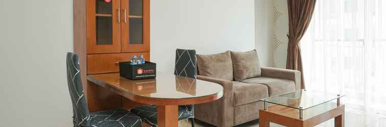 Lobby Comfy 2BR at City Home MOI Apartment Kelapa Gading By Travelio