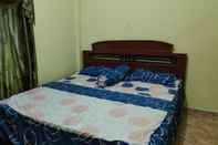 Kamar Tidur Guest House Bangau Putih