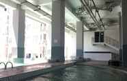 Swimming Pool 7 Simply 1BR Apartment at Stanford Jatinangor By Travelio