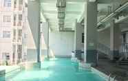 Swimming Pool 2 Simply 1BR Apartment at Stanford Jatinangor By Travelio