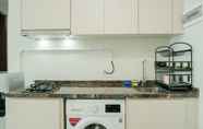 Ruang Umum 6 Homey and New Furnished 3BR Green Sedayu Apartment By Travelio