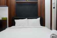 Kamar Tidur Homey and Comfort Studio Kebagusan City Apartment By Travelio