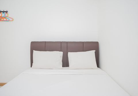 침실 Spacious and Comfort 2BR Apartment M-Town Residence By Travelio