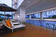 Swimming Pool Brand New Studio at H Residence Apartment By Travelio