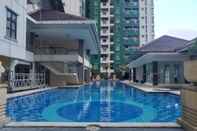 Swimming Pool Comfortable and Spacious @ 1BR Salemba Residence Apartment By Travelio