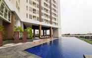 Kolam Renang 6 Homey and New Furnished 1BR at Silk Town Apartment By Travelio