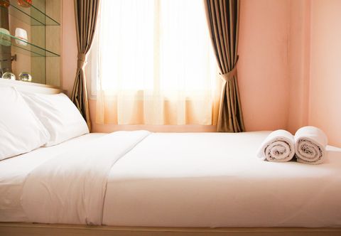 Bedroom Best Price 2BR Apartment at Mutiara Bekasi By Travelio