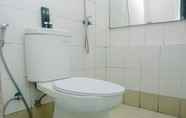 In-room Bathroom 7 Comfortable 2BR near Bassura Mall at Bassura City Apartment By Travelio
