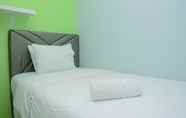 Bedroom 2 Comfortable 2BR near Bassura Mall at Bassura City Apartment By Travelio