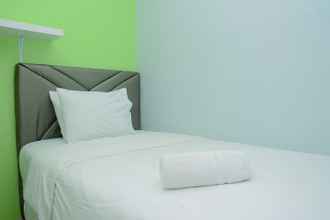 Bedroom 4 Comfortable 2BR near Bassura Mall at Bassura City Apartment By Travelio