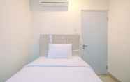 Kamar Tidur 2 Spacious and Comfy 3BR Grand Kamala Lagoon Apartment By Travelio