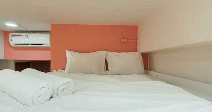 Bedroom Best Studio Apartment with Sofa Bed at Vittoria Residence By Travelio