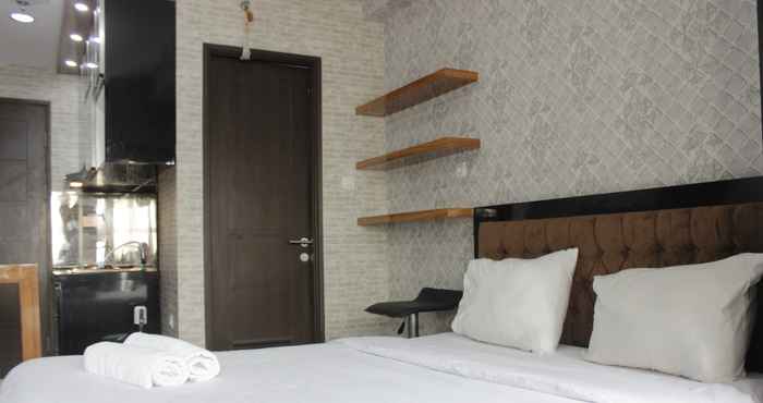 Bedroom Pleasant Studio Room Apartment at Mekarwangi Square Cibaduyut By Travelio