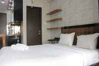 Bedroom Pleasant Studio Room Apartment at Mekarwangi Square Cibaduyut By Travelio