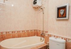 In-room Bathroom 6 Fully Furnished with Comfortable 2BR Apartment at Grand Palace Kemayoran By Travelio