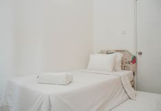 Bedroom 2 Fully Furnished with Comfortable 2BR Apartment at Grand Palace Kemayoran By Travelio