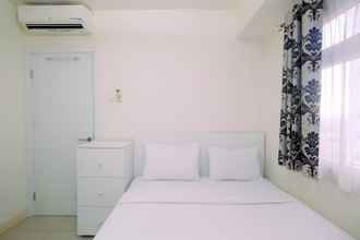 Bedroom 4 Relaxing 2BR Apartment at Green Pramuka By Travelio