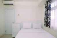 Bedroom Relaxing 2BR Apartment at Green Pramuka By Travelio