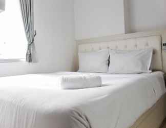 Bedroom 2 Comfort 2BR near Shopping Center at Bassura City Apartment By Travelio