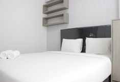 Bedroom 2 Homey 3BR Apartment near Exit Toll at Gateway Pasteur By Travelio