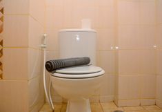 In-room Bathroom 5 Minimalist Studio for 2 Pax at Dave Apartment By Travelio