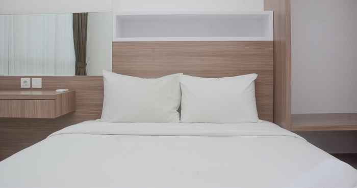 Kamar Tidur Modern 1BR Apartment at Ciputra World 2 By Travelio