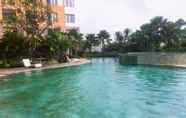 Swimming Pool 6 Comfort and Strategic 2BR Apartment at Cervino Village By Travelio