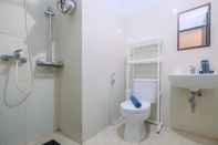 In-room Bathroom Comfort and Strategic 2BR Apartment at Cervino Village By Travelio