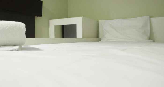 Bedroom Near Alun Alun Bandung 2BR Apartment at Grand Asia Afrika Residence By Travelio