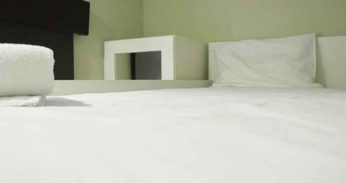 Kamar Tidur Near Alun Alun Bandung 2BR Apartment at Grand Asia Afrika Residence By Travelio