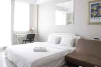 Bedroom Bright Studio at Dago Suites Apartment near ITB By Travelio