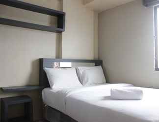 Bedroom 2 Cozy 2BR at Gateway Ahmad Yani Apartment By Travelio