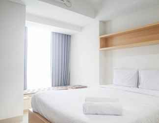 Kamar Tidur 2 Spacious Studio Apartment at Grand Sungkono Lagoon By Travelio