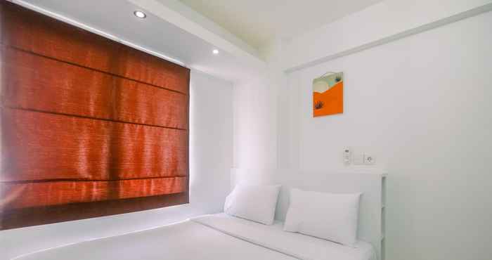 Bilik Tidur Simply Cozy 2BR Bassura City Apartment By Travelio