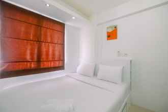 Bedroom 4 Simply Cozy 2BR Bassura City Apartment By Travelio