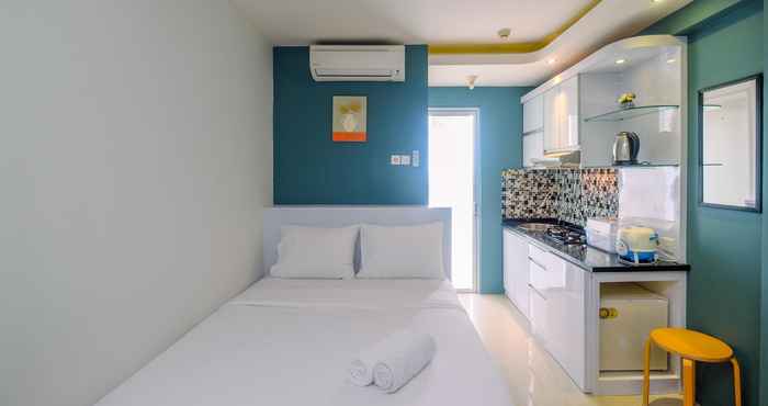 Bedroom Simply Good Studio Apartment at Bassura City By Travelio