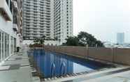 Swimming Pool 2 Strategic and Cozy Place Studio at Margonda Residence 4 Apartment By Travelio