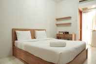 Kamar Tidur Strategic and Cozy Place Studio at Margonda Residence 4 Apartment By Travelio