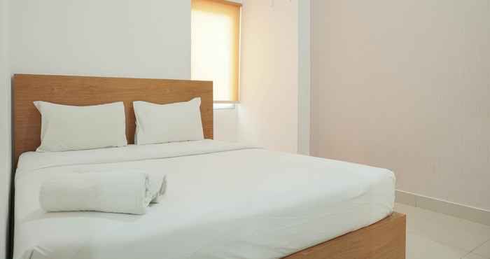 Bilik Tidur Cozy and Chic 2BR The Nest Puri Apartment By Travelio